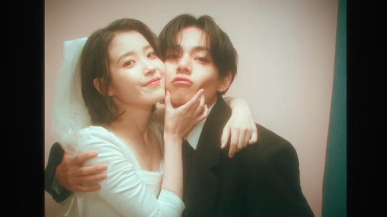 IU dan V BTS dalam lagu Love Wins All. (YouTube/ IU Official)