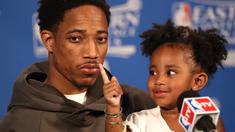 Pebasket Raptors, DeMar DeRozan #10 dicolok hidungnya oleh sang putri tercinta, Diar DeRozan saat memberikan keterangan pers usai  Final Wilayah Barat  NBA Playoffs 2016 di Air Canada Centre, (23//5/2016). Tom Szczerbowski/Getty Images/AFP