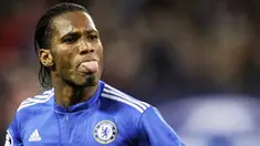 Gaya striker Chelsea, Didier Drogba seusai mencetak gol kedua ke gawang Atletico Madrid di penyisihan Grup D Liga Champions yang digelar di Vicente Calderon, 3 November 2009. Hasil akhir 2-2.AFP PHOTO/PIERRE-PHILIPPE MARCOU 
