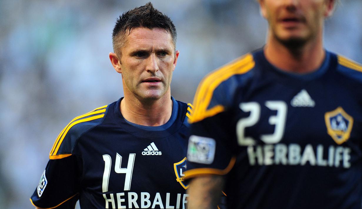 Robbie Keane bergabung dengan LA Galaxy pada 2011 setelah dipinjamkan oleh Tottenham Hotspur ke Celtic dan West Ham. Pria asal Irlandia itu sukses mengantongi 92 gol dalam 146 penampilannya. Selain itu, Keane juga berhasil mempersembahkan tiga Piala MLS untuk LA Galaxy dan terpilih menjadi MLS Best XI dalam empat musim berturut-turut antara 2012 dan 2015. Ia juga mendapatkan penghargaan MVP pada tahun 2014. (AFP/Frederic J. Brown)