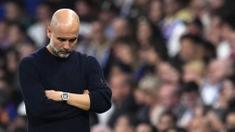 Pelatih Manchester City, Pep Guardiola tak mampu menutupi rasa kecewa setelah timnya kalah dari Real Madrid dalam laga leg 2 play off Liga Champions 2024/2025 di Santiago Bernabeu, Madrid, Spanyol, Rabu (20/02/2025) waktu setempat. (AP Photo/Manu Fernandez)