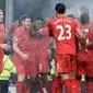 Para pemain Liverpool merayakan gol Sadio Mane (2kanan) saat melawan Everton pada Derby Merseyside di Goodison Park, Liverpool, (19/12/2016). Liverpool menang 1-0. (AFP/Oli Scarff)