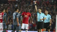 Bek MU, Eric Bailly juga terlibat perkelahian dengan Facundo Rocaglia, yang juga mendapat kartu merah. (AP Photo/Dave Thompson)