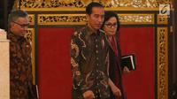 Presiden Joko Widodo (Jokowi) didampingi Menteri Keuangan Sri Mulyani dan  Kepala Otoritas Jasa Keuangan (OJK) Wimboh Santoso saat menerima pimpinan bank umum Indonesia di Istana Negara, Jakarta, Kamis (15/3). (Liputan6.com/Angga Yuniar)