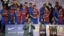 5. Pada musim pertamanya Josep Guardiola berhasil mempersembahkan treble (La Liga, Copa Del Rey dan Piala Champions). Debut yang sensasional bagi seorang pelatih baru. (AFP/Lluis Gene)