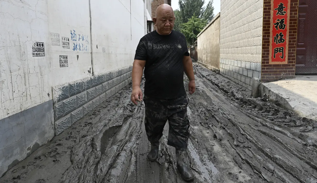 Di provinsi Hebei, yang bertetangga dengan Beijing, 15 orang dilaporkan tewas dan 22 orang hilang. (Jade Gao / AFP)