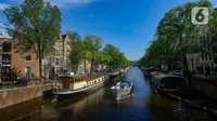 Amsterdam dikenal di seluruh dunia karena kanal-kanalnya yang indah melintasi kota. (merdeka.com/Arie Basuki)