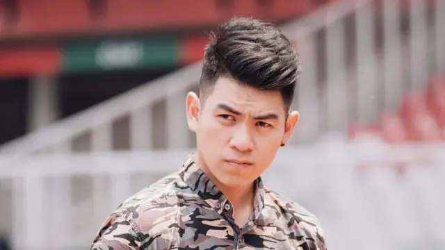 Andi Sugiarto Budiman atau lebih populer disapa Andy Sugar menggandeng Gibran Rakabuming Raka di video TikToknya.