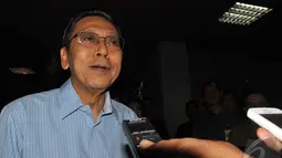 Boediono mengaku sempat membisiki Guru Besar Kehutanan dan Pertanian Universitas Gajah Mada (UGM) itu, Jakarta, Rabu (27/8/2014) (Liputan6.com/Miftahul Hayat)