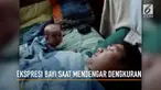 Menggemaskan, begini ekspresi kaget seorang bayi saat mendengar ayahnya mendengkur keras.