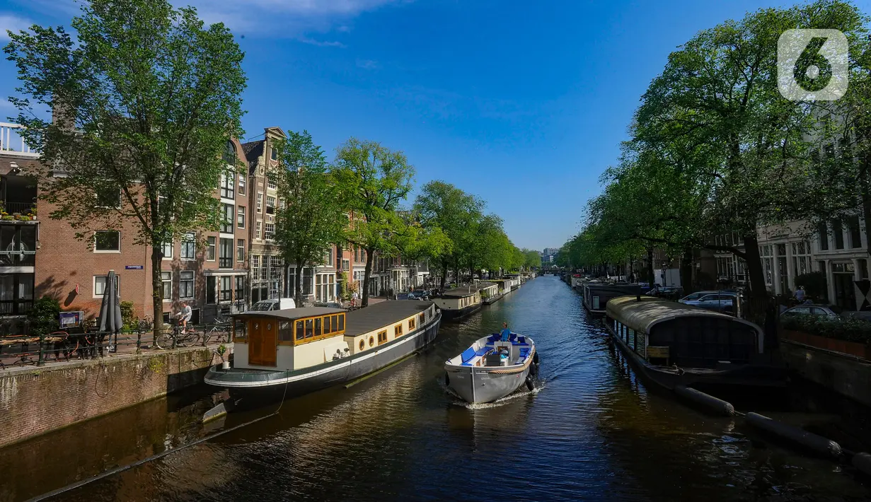 Amsterdam dikenal di seluruh dunia karena kanal-kanalnya yang indah melintasi kota. (merdeka.com/Arie Basuki)
