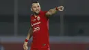 Penyerang Persija Jakarta, Marko Simic melakukan selebrasi usai mencetak gol kedua timnya ke gawang PSIS Semarang dalam laga pekan kedua BRI Liga 1 2021/2022 di Indomilk Arena, Tangerang, Minggu (12/9/2021). Kedua tim bermain imbang 2-2. (Foto: Bola.Com/M
