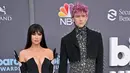 <p>Megan Fox dan Machine Gun Kelly tampil serasi di red carpet Billboard Music Awards 2022. Keduanya mengenakan busana serba hitam, Megan Fox memilih dress rancangan David Koma, sedangkan Kelly mengenakan Dolce &amp; Gabbana.</p>