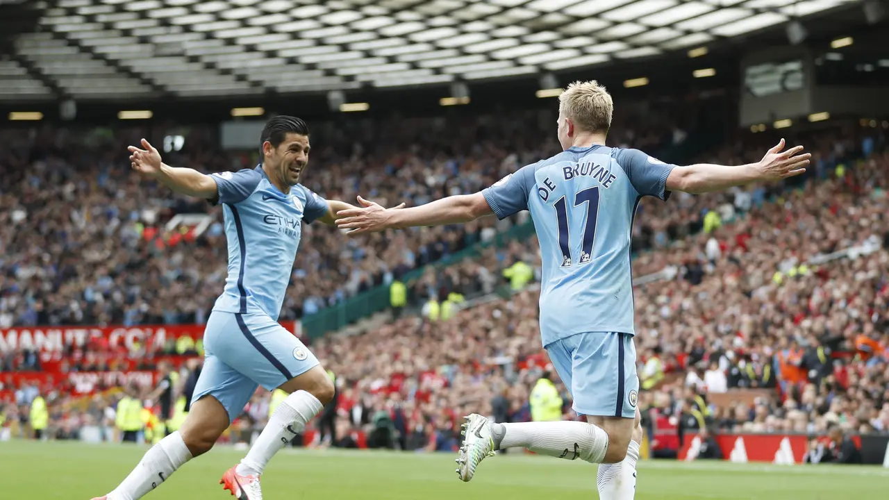Gelandang Manchester City Kevin de Bruyne usai cetak gol ke gawang Manchester United (Reuters)