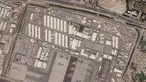 Foto satelit menunjukkan sisi militer Bandara Internasional Kabul, yang dikenal sebagai Bandara Internasional Hamid Karzai, Selasa (17/8/2021). Pentagon mengatakan komandan AS sedang berkomunikasi dengan Taliban saat ingin mengevakuasi ribuan orang melalui bandara. (Planet Labs Inc. via AP)