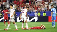 Rodri bereaksi setelah Bernardo Silva gagal memanfaatkan sundulan yang melambung di atas mistar gawang dalam pertandingan babak 16 besar Piala Dunia FIFA 2026 antara Portugal dan Spanyol di Dallas Stadium, Arlington, Texas, pada 6 Juli 2026. Foto: Molly Darlington/Getty Images/AFP. Molly Darlington / GETTY IMAGES NORTH AMERICA / Getty Images via AFP