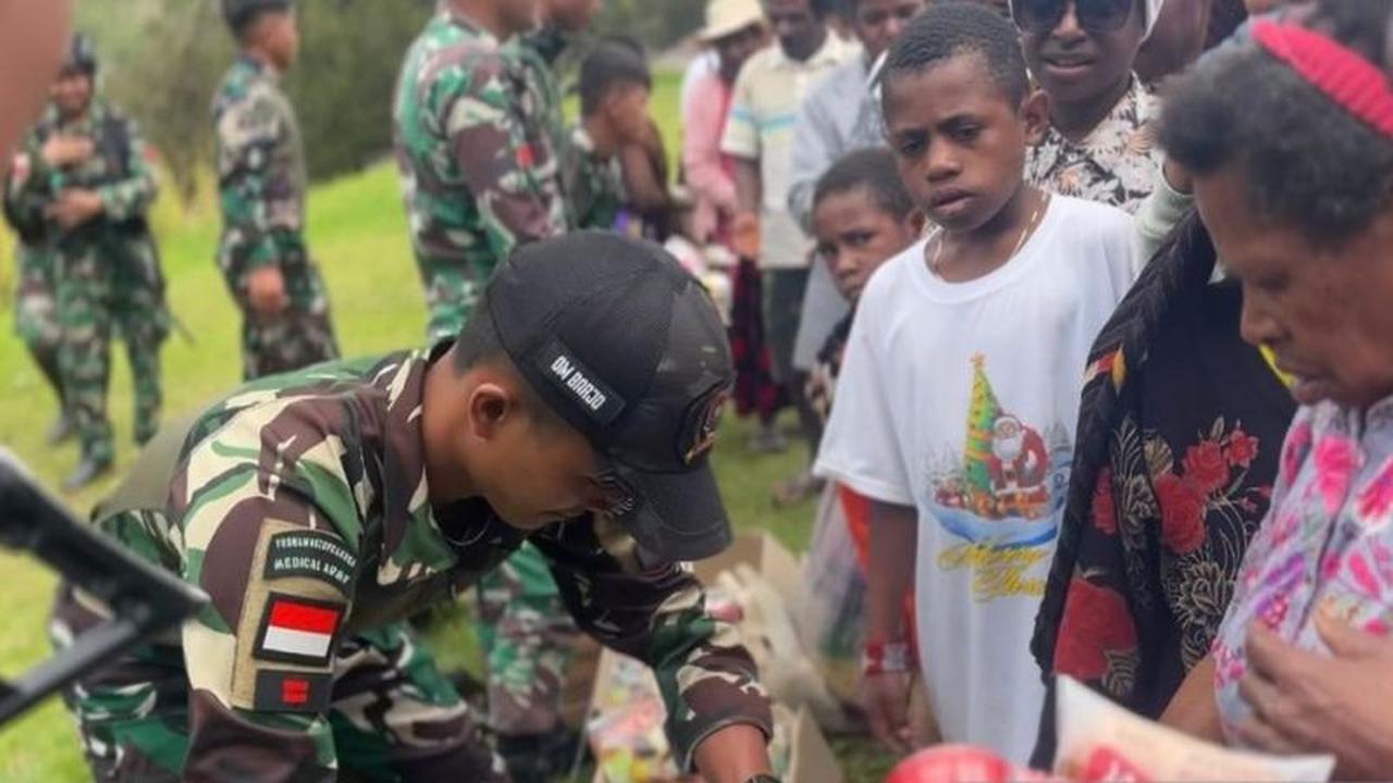 Prajurit Satgas Yonif 511/DY Lanny Jaya Tebar Kebahagiaan di Pirime Sambut Tahun Baru 2026
