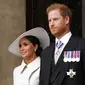 Meghan Markle dan Pangeran Harry. (AP Photo/Matt Dunham, Pool)