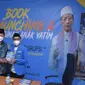 Imam Besar Masjid Istiqlal Prof Dr KH Nasaruddin Umar MA (kiri) didampingi penulis buku PMII di Era Disrupsi, Muhammad Syarif Hidayatullah saat peluncuran buku tersebut, Selasa (23/2/2021). (Ist)