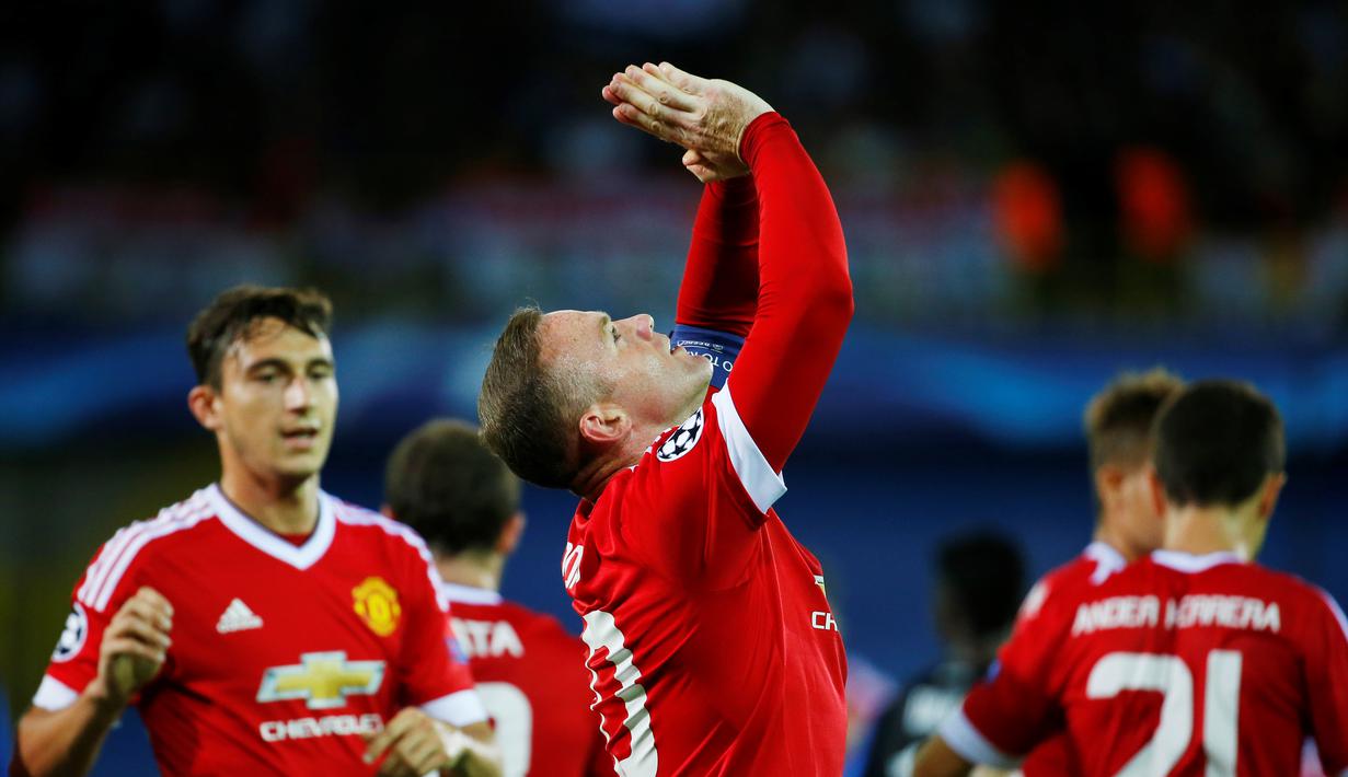 Wayne Rooney membuntuti Ruud van Nistelrooy dengan 36 gol. (Reuters/Yves Herman)
