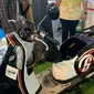 Motor Scoopy hasil konversi Dharma Polimetal ke tenaga listrik sistem mid drive 2 kW. (Khizbulloh Huda/Liputan6.com)