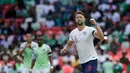 Pemain Inggris, Gary Cahill melakukan selebrasi usai mencetak gol ke gawang Nigeria dalam laga uji coba Piala Dunia 2018 di Stadion Wembley, London, Inggris, Sabtu (2/6). Inggris berhasil menekuk Nigeria dengan skor 2-1.  (AP Photo/Matt Dunham)