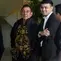 Ketua Umum Pemuda Pancasila (PP) Japto Soerjosoemarno (kedua kiri) bersiap meninggalkan Gedung Merah Putih Komisi Pemberantasan Korupsi (KPK) usai menjalani pemeriksaan di Jakarta, Rabu (26/2/2025). (Liputan6.com/Herman Zakharia)