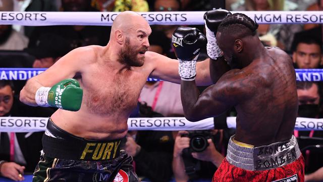 <span>Pertarungan Tyson Fury vs Deontay Wilder di T Mobile Arena, Las Vegas Amerika Serikat (Robyn Beck /AFP)</span>