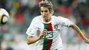 Aksi defender Portugal Fabio Coentrao di laga penyisihan Grup G PD 2010 melawan Pantai Gading yang berlangsung di Nelson Mandela Bay Stadium, Port Elizabeth, 15 Juni 2010. AFP PHOTO / KARIM JAAFAR 