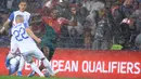 Pada laga menghadapi Slovakia, Portugal sebenarnya tetap menjaga catatan cleansheet hingga babak pertama usai dengan keunggulan 2-0. Dua gol tersebut dicetak Goncalo Ramos pada menit 18, dan penalti Cristiano Ronaldo pada menit 29. (AP Photo/Luis Vieira)