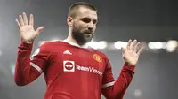 Meski rekor clean sheetnya tak bagus, Luke Shaw telah menjalankan tugas sebagai bek kiri MU dengan baik. Tak hanya sebagai pemain bertahan, ia juga sukses melesatkan tiga assist dalam 20 penampilannya di semua kompetisi musim ini. (AFP/Olis Scarff)