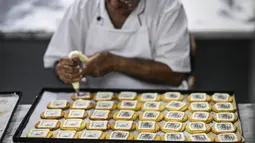 Ide ini berawal dari lelucon antara salah satu pemilik Balcao do Marques, Fernando Santos, dan para koki pastrinya. (Patricia DE MELO MOREIRA / AFP)