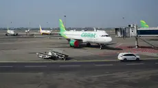 Pesawat diparkir di Bandara Internasional Soekarno-Hatta di Tangerang, Indonesia, Minggu, 6 September 2026. (AP Photo/Tatan Syuflana)