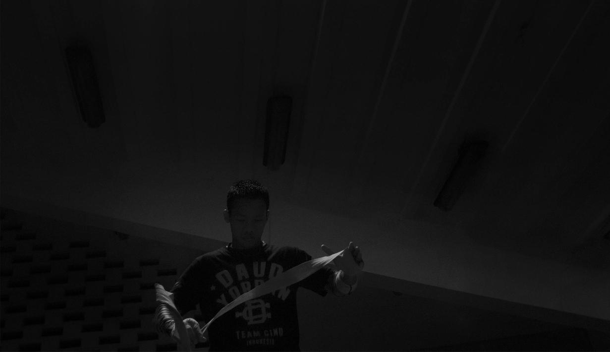 Daud Yordan mengaku terkadang lelah harus terus belatih dan berlatih. Namun rasa itu sirna saat dirinya mengingat anak dan istrinya. (Bola.com/Vitalis Yogi Trisna)