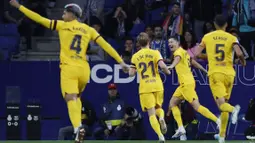 Kemenangan di markas Espanyol itu membuat Barcelona kini memiliki 85 poin dari 34 laga, unggul 14 poin dari Real Madrid yang berada di posisi kedua. Barcelona pun memastikan diri sebagai juara dan tak lagi bisa dikejar oleh rivalnya. (AP Photo/Joan Monfort)