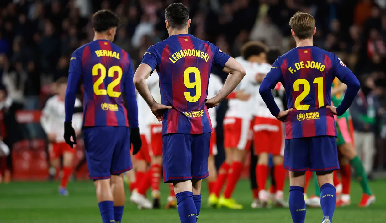 Namun, Girona mampu menyamakan kedudukan tiga menit berselang lewat Thomas Lemar dan membalikkan keadaan melalui gol pemain barunya, Fran Beltran pada menit ke-86. (AP Photo/Joan Monfort)
