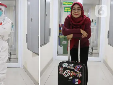 Perawat Nurlaila (43) berpose dengan Alat Perlindung Diri (APD) dan koper saat di jumpai di Rumah Sakit Haji, Jakarta. Ela selain menangani pasien Covid-19 ia mempunyai hobi traveling. (Liputan6.com/Herman Zakharia)