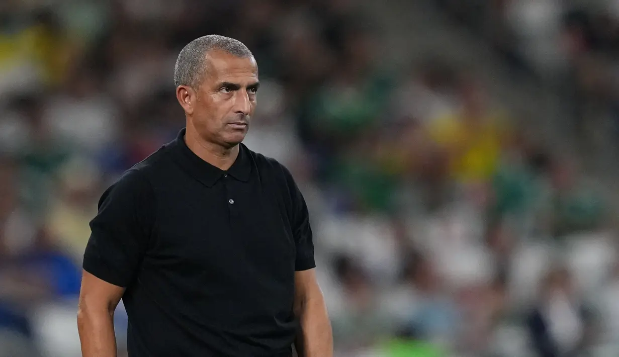 Pelatih asal Prancis itu sejatinya sudah berada dalam tekanan sebelum turnamen ini berlangsung. Tepatnya ketika Tunisia menelan kekalahan telak 0-5 dari Belgia dalam laga uji coba Piala Dunia di Brussels. (AP Photo/Moises Castillo)