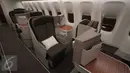 Bagian dalam pesawat Garuda Indonesia Boeing B777-300ER di Bandara Internasional Soekarno Hatta, Tangerang, Banten, Kamis (29/10). Pesawat ini memiliki kapasitas penumpang 393 seat yang terbagi menjadi dua kelas. (Liputan6.com/Angga Yuniar)