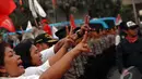 Pihak Kepolisian tampak berjaga-jaga disekitar aksi Relawan Jokowi-JK di Bundaran HI, Jakarta, Rabu (9/7/2014) (Liputan6.com/Miftahul Hayat)