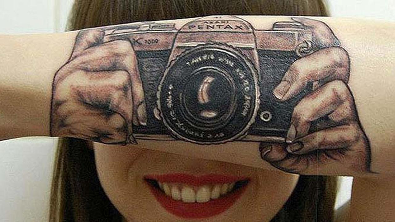 10 Tattoo Aneh yang Pernah Ada di Dunia