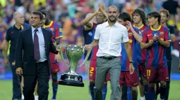 Pep Guardiola. Sebagai pemain, ia membela Barcelona selama 11 musim, mulai 1990/1991 hingga 2000/2001. Sebagai pelatih, ia membesut Barcelona selama 4 musim, mulai 2008/2009 hingga 2011/2012 dan berhasil mempersembahkan 3 gelar LaLiga beruntun, 2008/2009 hingga 2010/2011. (AFP/Josep Lago)