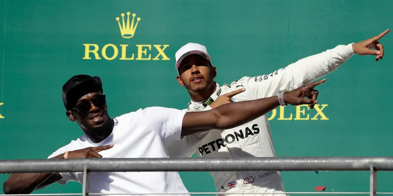 Lewis Hamilton dan Usain Bolt di Podium GP Amerika Serikat