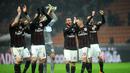 Pemain AC Milan merayakan kemenangan atas Torino pada laga lanjutan Serie A Italia di Stadion San Siro, Minggu (28/2/2016) dini hari WIB. (EPA/Daniele Mascolo)