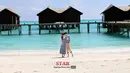 <p>Sungmin Super Junior dan Kim Sa Eun memamerkan kemesraan mereka saat berbulan madu di Pulau Maldives. (www.koreaboo.com)</p>