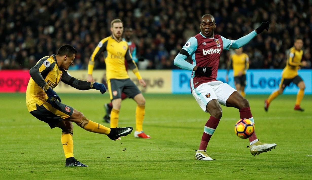Aksi individu Alexis Sanchez melewati dua pemain The Hammers dilanjutkan tembakan dari sudut sempit yang bersarang di pojok gawang kiper West Ham, Darren Randolph. (Action Images via Reuters/John Sibley)