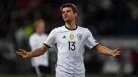 Thomas Muller telah bermain sebanyak 12 kali pada tiga edisi Euro sekaligus (2012 hingga 2020). Sayangnya ia belum diberi kesempatan untuk mencetak gol sejauh ini. Padahal penampilannya bersama Jerman sangat gemilang dengan mengoleksi 39 gol dan 37 assist dari 103 caps. (Foto: AFP/Patrik Stollarz)