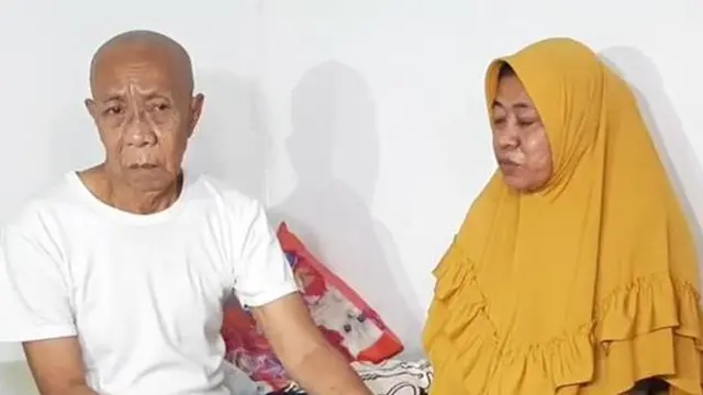 Pak Ogah dan istrinya