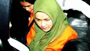 Istri Gubernur Sumatera Utara, Evy Susanti ditahan usai menjalani pemeriksaan di KPK, Jakarta, Senin (3/8/2015). Evy ditahan terkait kasus suap terhadap hakim PTUN Medan. (Liputan6.com/Helmi Afandi)