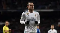 Gelandang Real Madrid, Gareth Bale, kabarnya tak memiliki niat untuk hengkang pada bursa transfer musim panas 2018 nanti. (AFP/PIERRE-PHILIPPE MARCOU)